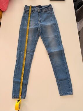 Light Wash Distressed Skinny Jeans
